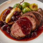 Rehrücken Zart rosa gebratener Rehrücken, begleitet von süßer Preiselbeer-Birne, einer samtigen Portweinsauce und knackigem Rosenkohl. 38